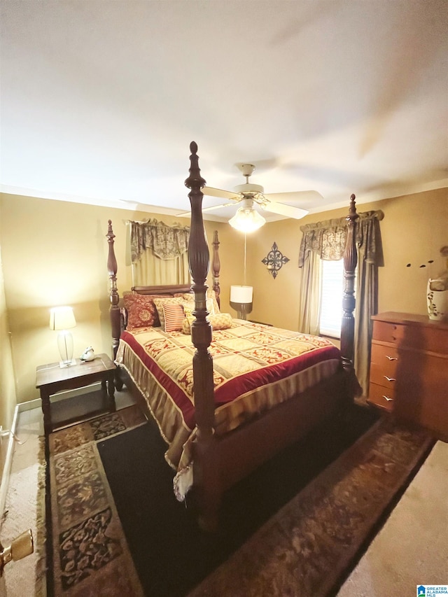 bedroom featuring ceiling fan and carpet floors