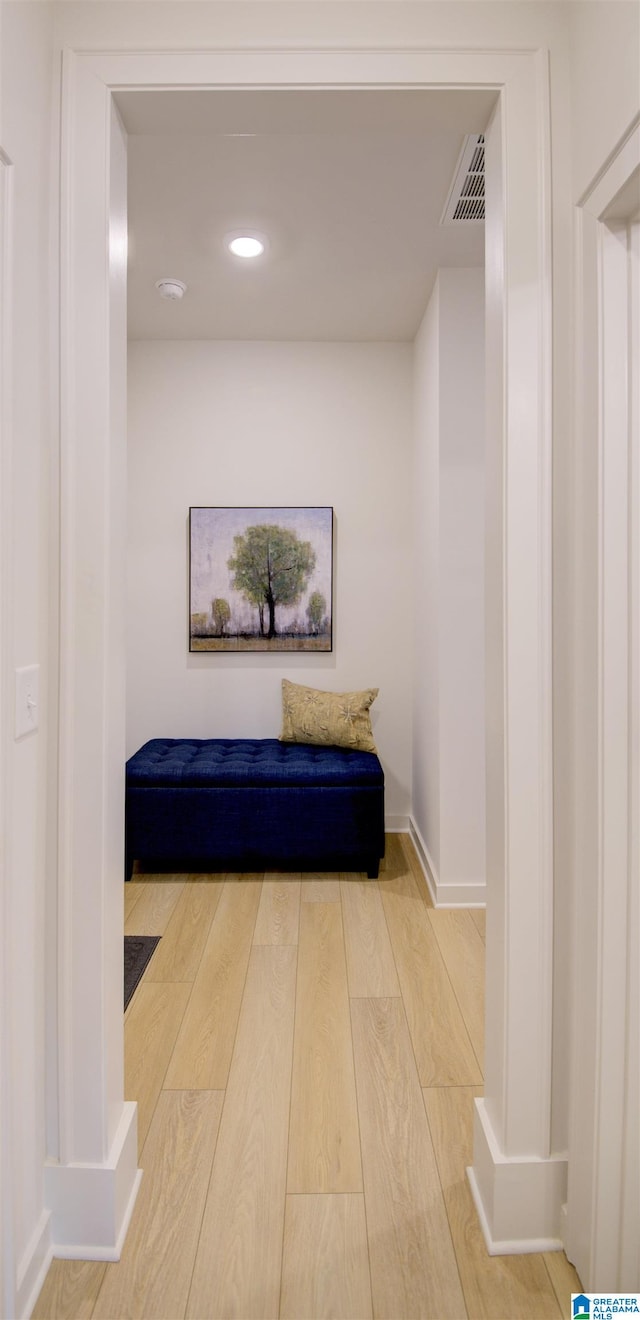 hallway featuring light hardwood / wood-style flooring