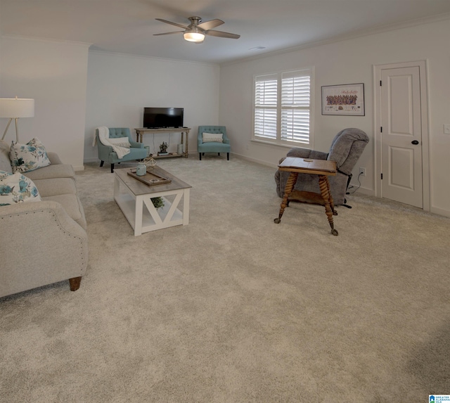 living room featuring light carpet, ceiling fan, and ornamental molding