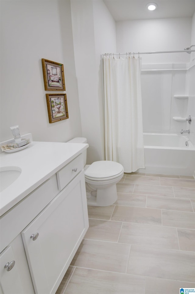 full bathroom with shower / bath combo, toilet, and vanity