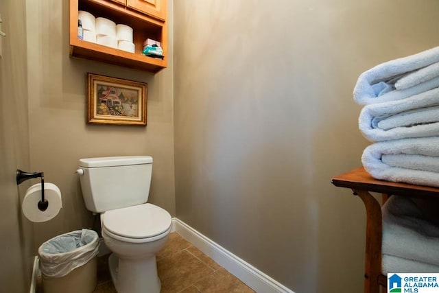 bathroom featuring tile patterned flooring and toilet