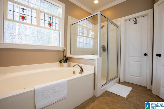 bathroom featuring tile patterned floors, independent shower and bath, and ornamental molding