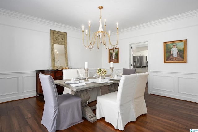 dining space featuring crown molding, dark hardwood / wood-style floors, and a notable chandelier