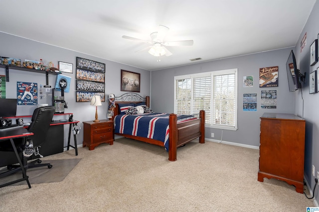 bedroom with ceiling fan and light colored carpet