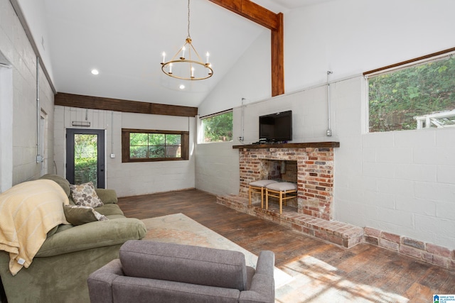 living room featuring dark wood-type flooring, beam ceiling, high vaulted ceiling, a chandelier, and a wood stove