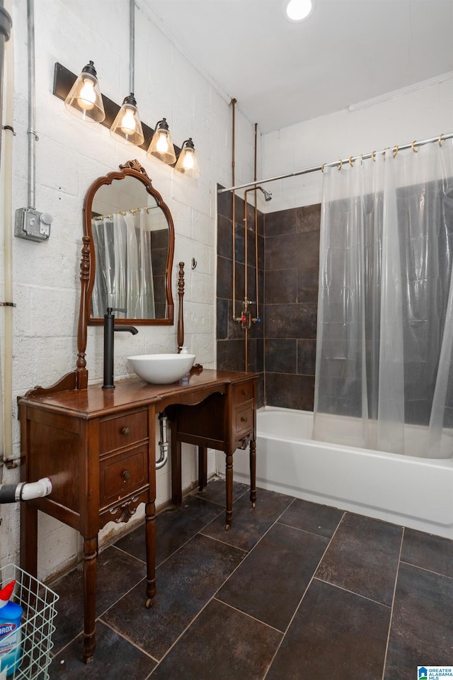 bathroom featuring shower / tub combo and sink