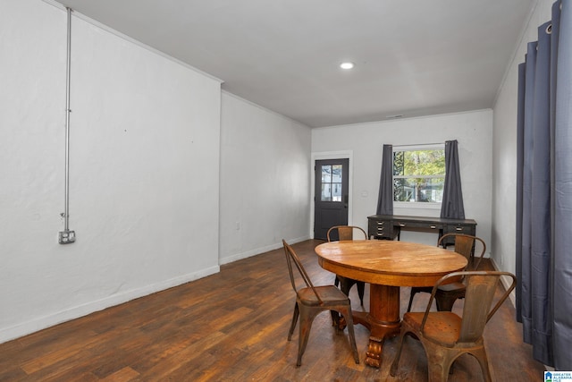 dining area featuring dark hardwood / wood-style flooring