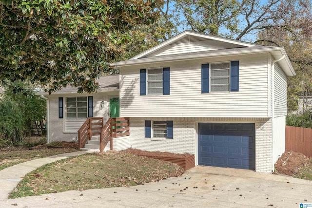 split level home with a garage