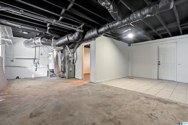 basement with heating unit and water heater