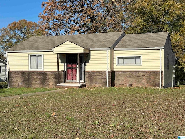 view of front of home with a front yard