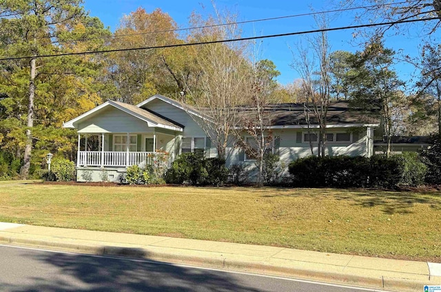 single story home with a porch and a front lawn