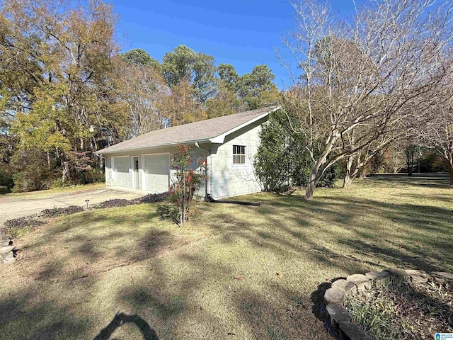 1807 Moncrief Rd, Gardendale, AL 35071 - view of side of property featuring an outbuilding and a lawn