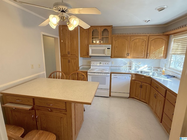 1807 Moncrief Rd, Gardendale, AL 35071 - kitchen with white appliances, crown molding, a sink, glass insert cabinets, and a ceiling fan
