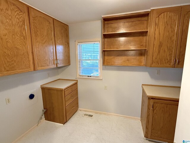1807 Moncrief Rd, Gardendale, AL 35071 - washroom featuring baseboards, hookup for an electric dryer, and cabinet space