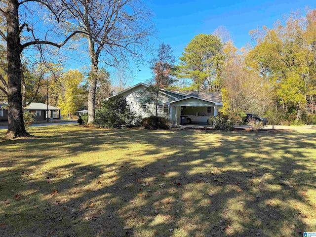 exterior space featuring a yard