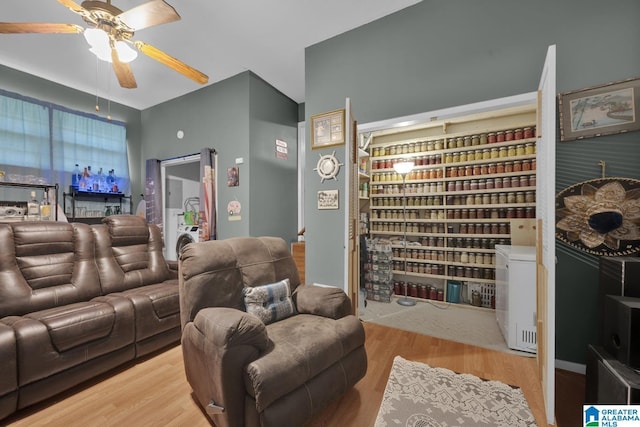 interior space featuring hardwood / wood-style floors and ceiling fan