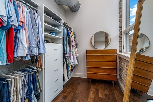 walk in closet featuring dark wood-type flooring