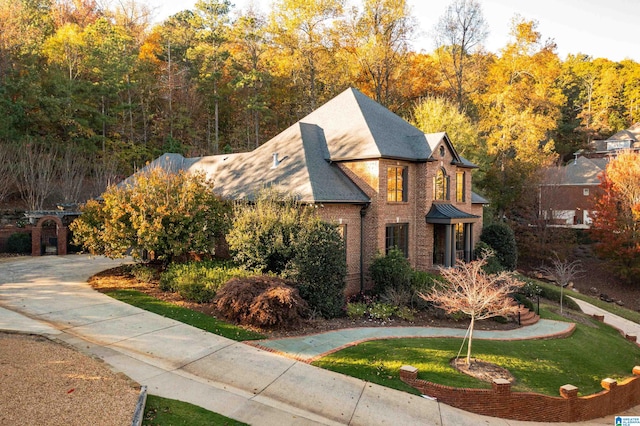 view of property exterior featuring a yard