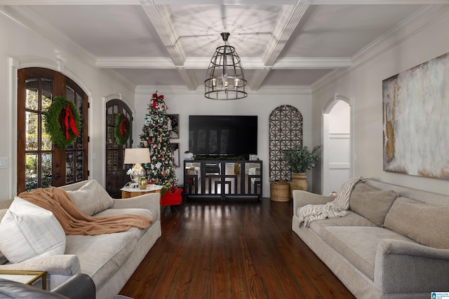 living room featuring beam ceiling, coffered ceiling, dark hardwood / wood-style flooring, a notable chandelier, and ornamental molding