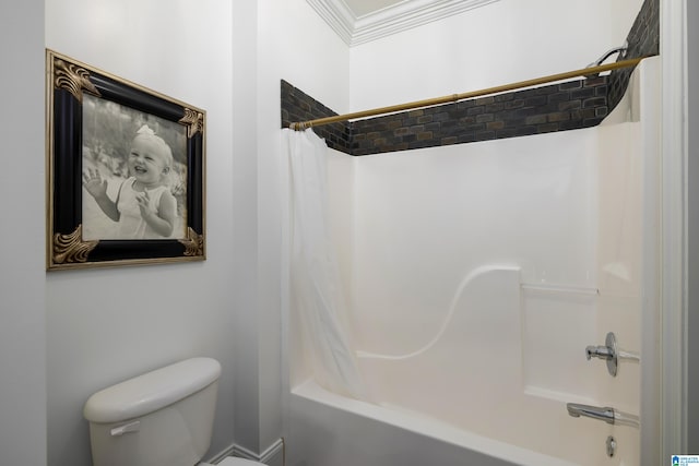 bathroom featuring toilet, ornamental molding, and shower / tub combo with curtain