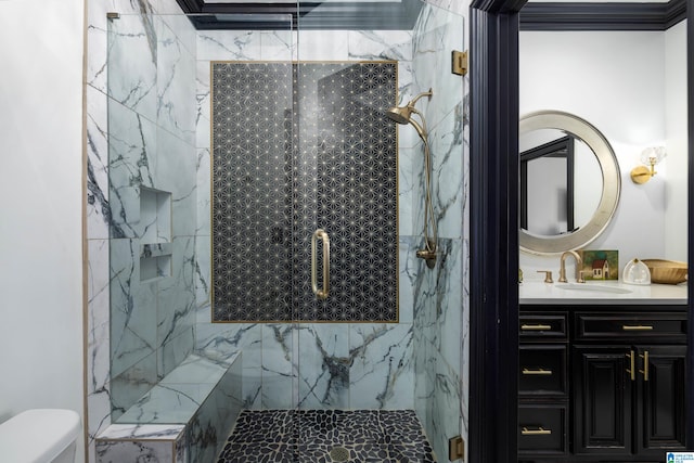 bathroom with toilet, an enclosed shower, crown molding, and vanity