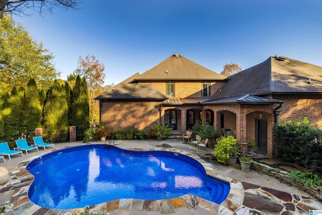 view of pool with a patio