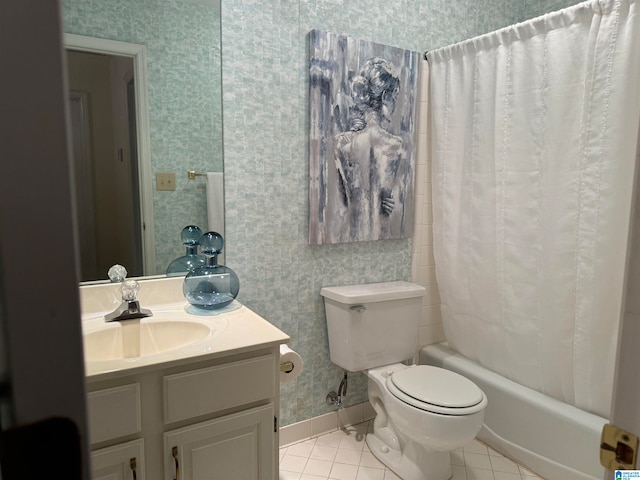 full bathroom with tile patterned flooring, toilet, vanity, and shower / bath combo with shower curtain