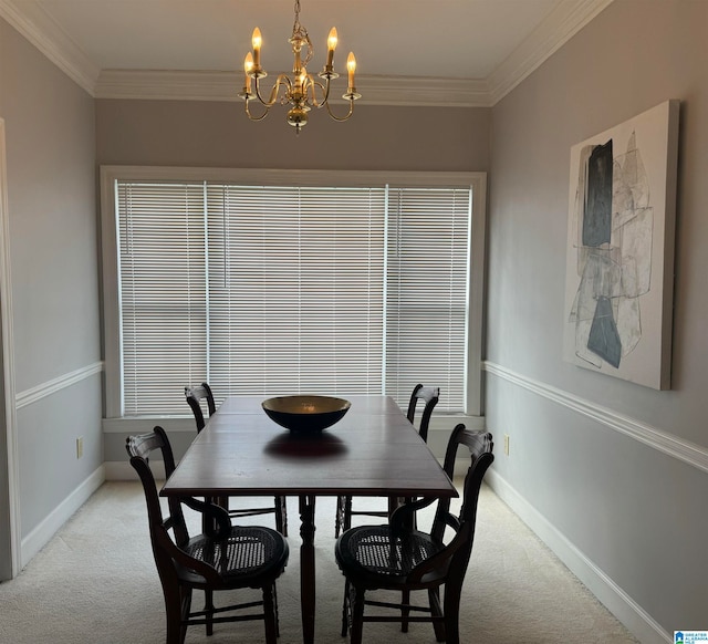 dining space featuring ornamental molding, a chandelier, light carpet, and plenty of natural light