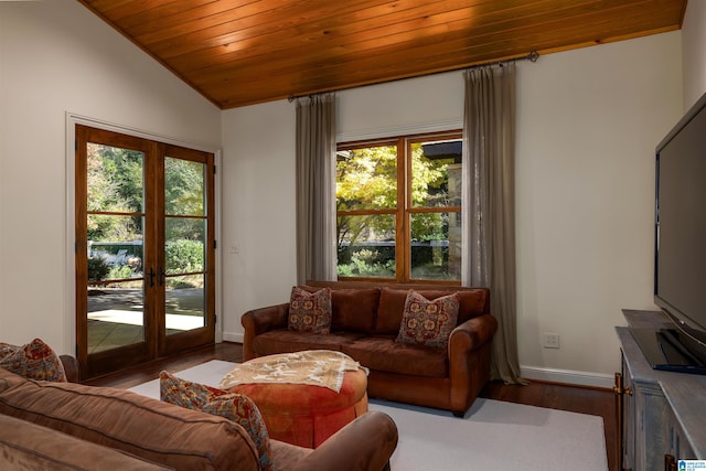 living room with hardwood / wood-style floors, a healthy amount of sunlight, lofted ceiling, and wooden ceiling