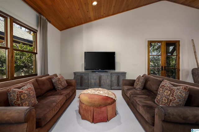 living room with french doors, wood ceiling, and lofted ceiling