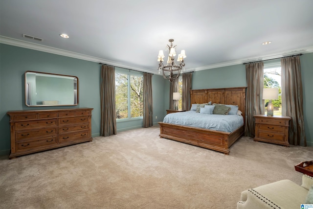 carpeted bedroom with ornamental molding and a chandelier