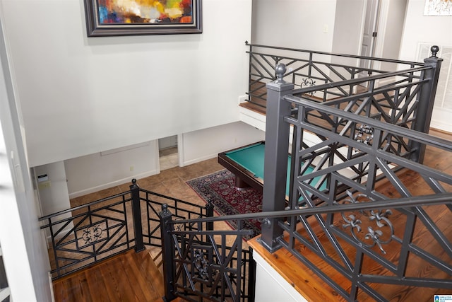 staircase featuring hardwood / wood-style flooring