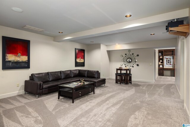 living room featuring light colored carpet