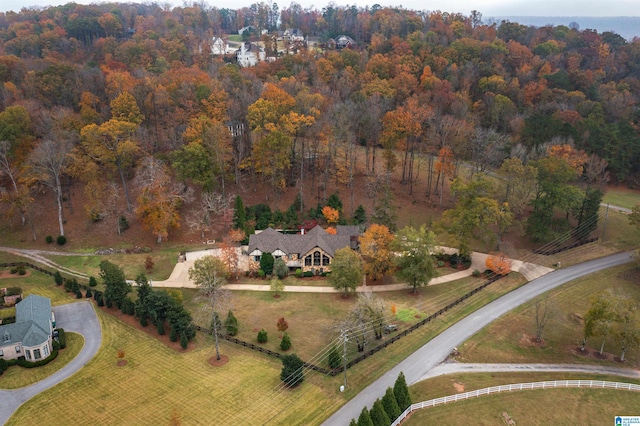 birds eye view of property with a rural view