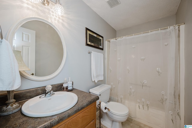 full bathroom with vanity, shower / bath combo, tile patterned flooring, toilet, and a textured ceiling