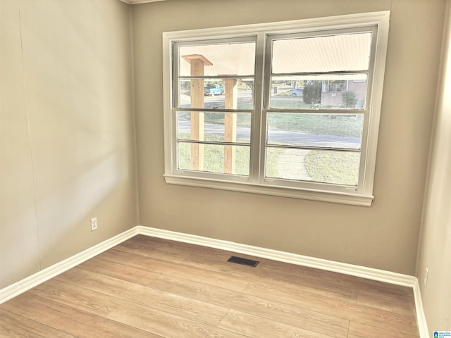 16 9th Ter, Birmingham, AL 35211 - spare room featuring light wood-type flooring and baseboards