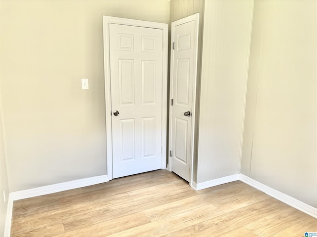 16 9th Ter, Birmingham, AL 35211 - empty room with light wood-style flooring and baseboards