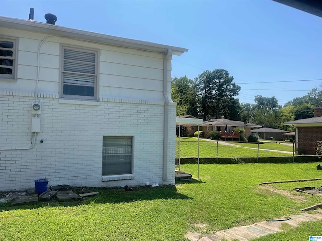 view of property exterior featuring a lawn