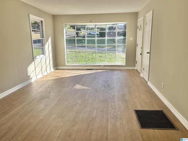 16 9th Ter, Birmingham, AL 35211 - unfurnished room featuring wood finished floors and baseboards