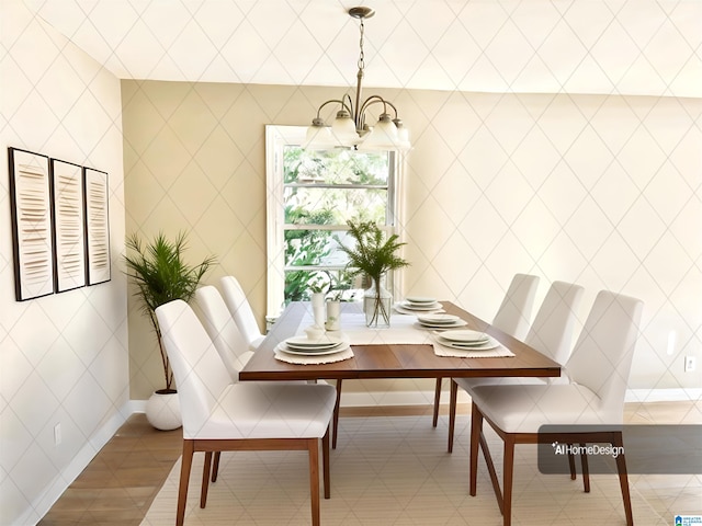 dining room with a notable chandelier and tile walls