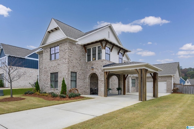 view of front facade featuring a carport and a front lawn