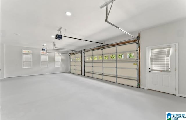 garage featuring a garage door opener