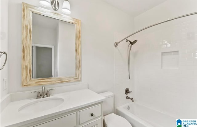 full bathroom featuring vanity,  shower combination, and toilet