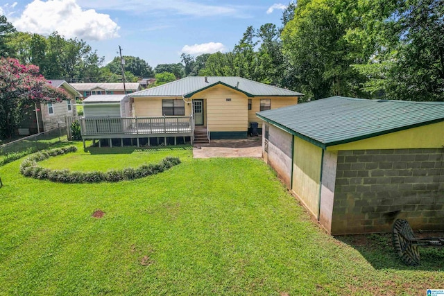 view of yard featuring a deck