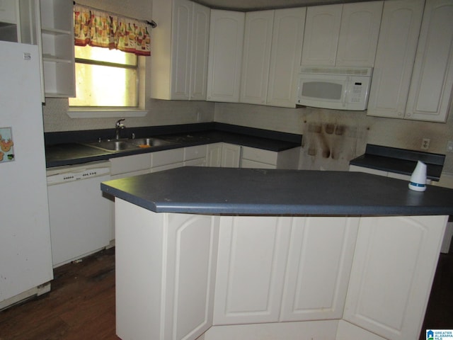 2324 Pentland Dr, Birmingham, AL 35235 - kitchen featuring white appliances, a sink, dark countertops, and dark wood finished floors