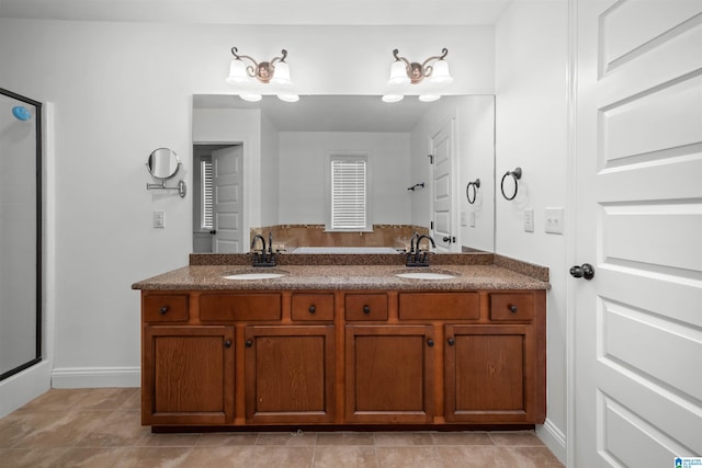 bathroom featuring vanity, tile patterned floors, and an enclosed shower