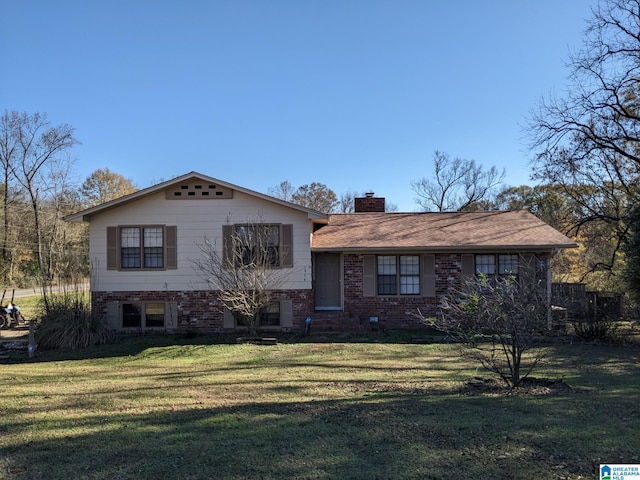 split level home featuring a front yard