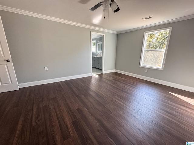 spare room with dark hardwood / wood-style floors, ceiling fan, ornamental molding, and sink