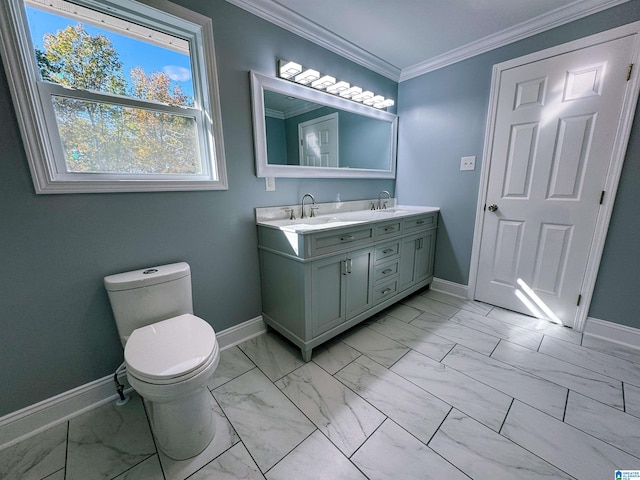 bathroom with vanity, toilet, and crown molding