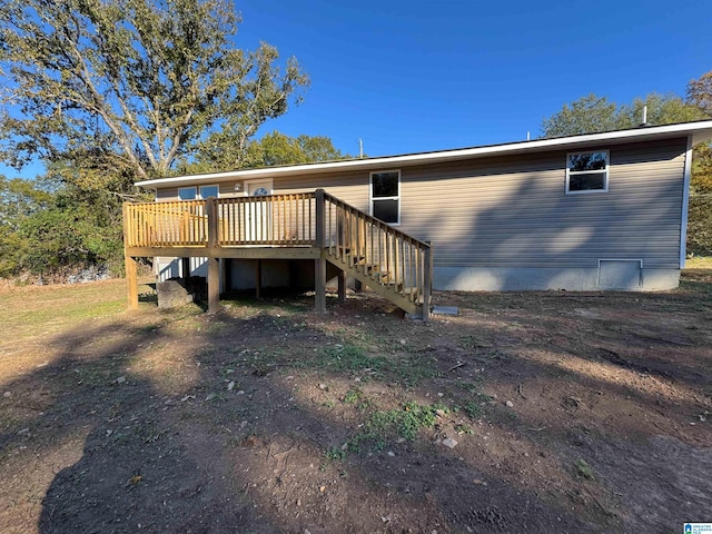 view of front facade featuring a wooden deck